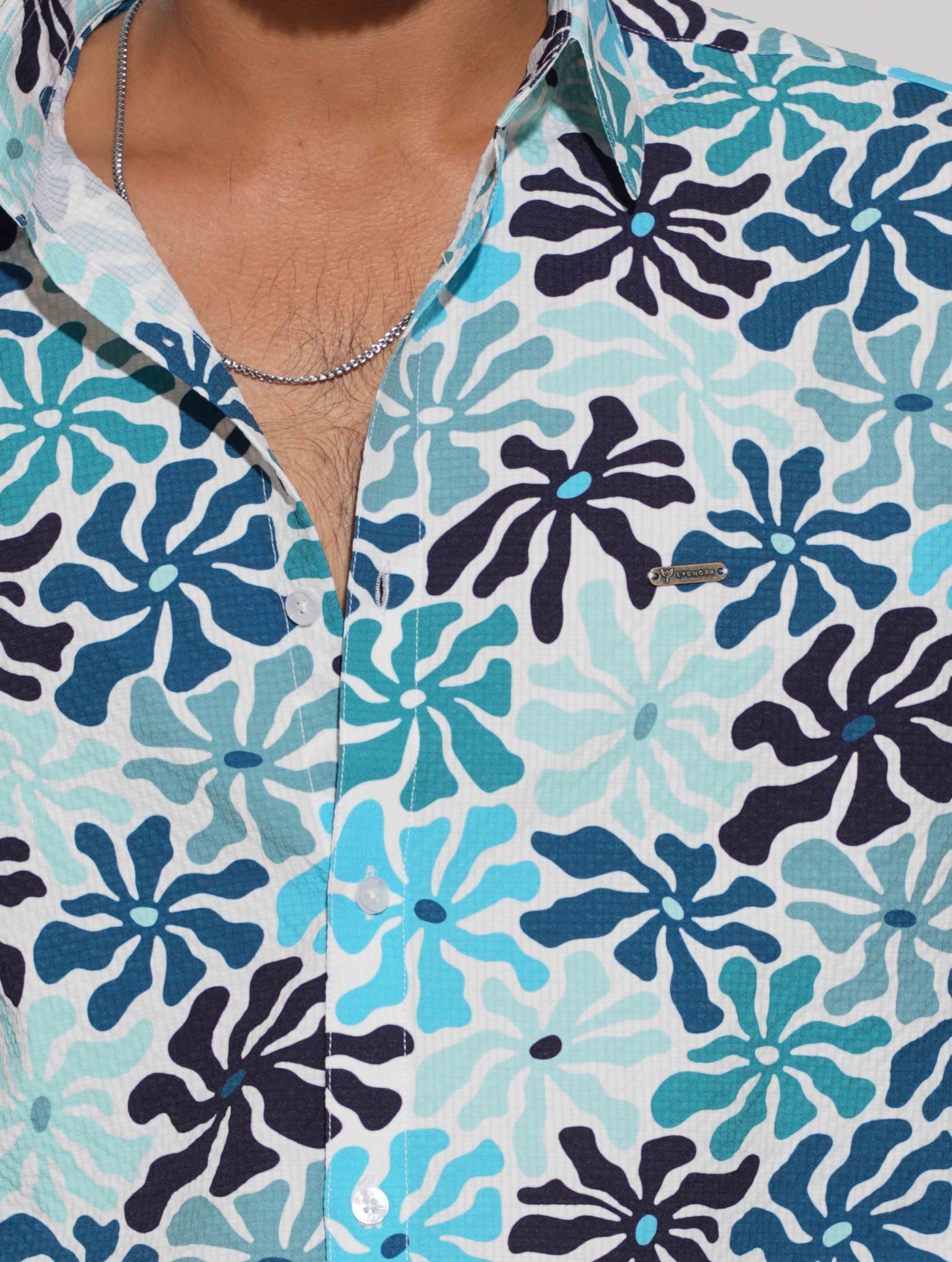 Turquoise blue flower printed drop shoulder half sleeve